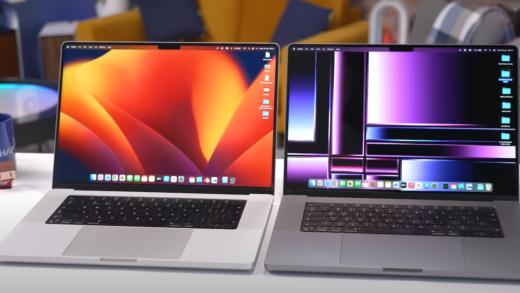 Two MacBooks placed on a table
