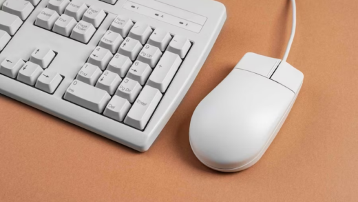 A white keyboard and mouse in close-up view