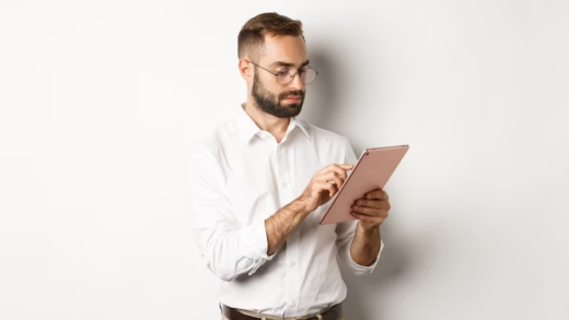 Man Working on the Tablet